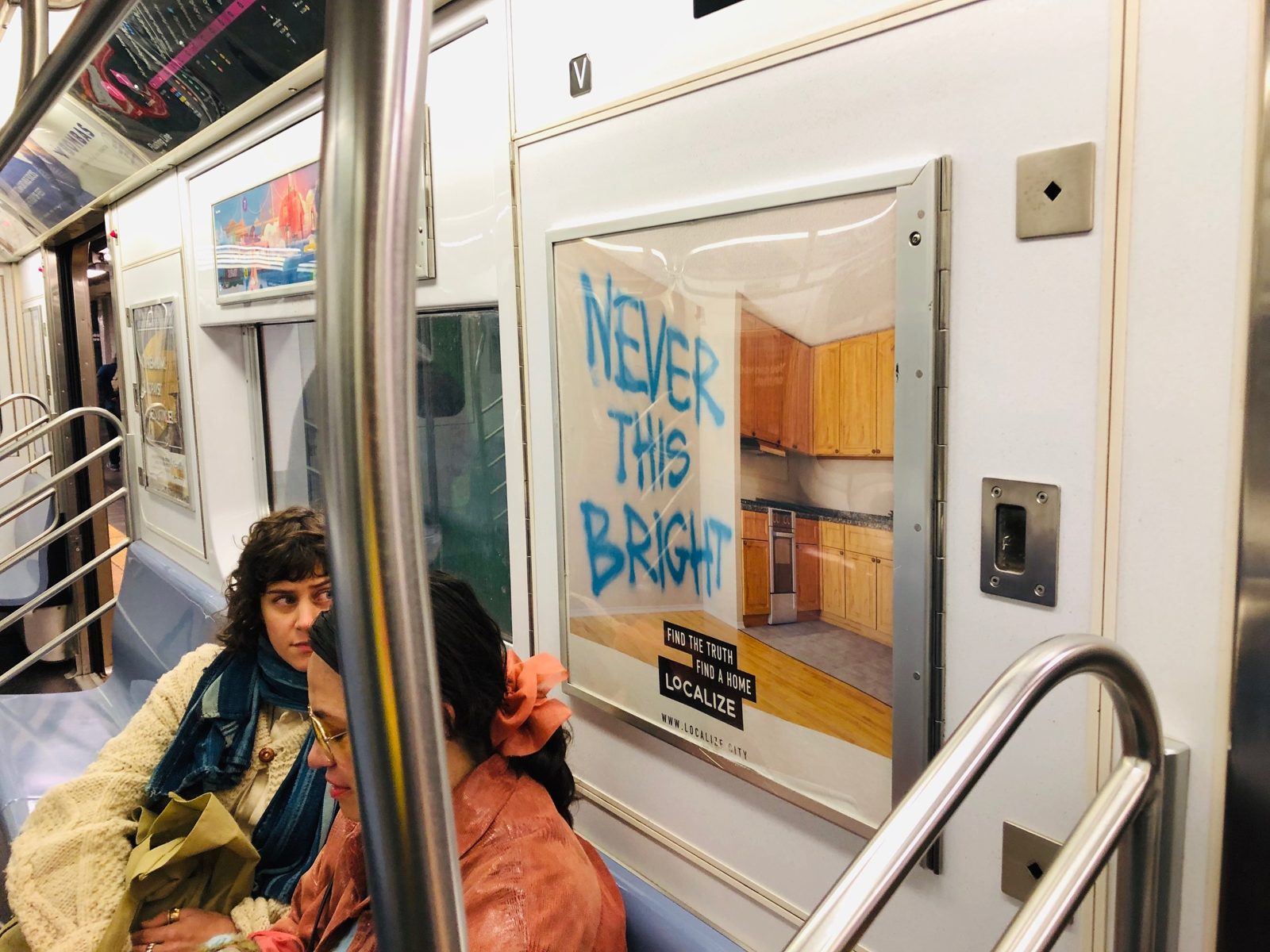 Localize subway car card: Never this bright